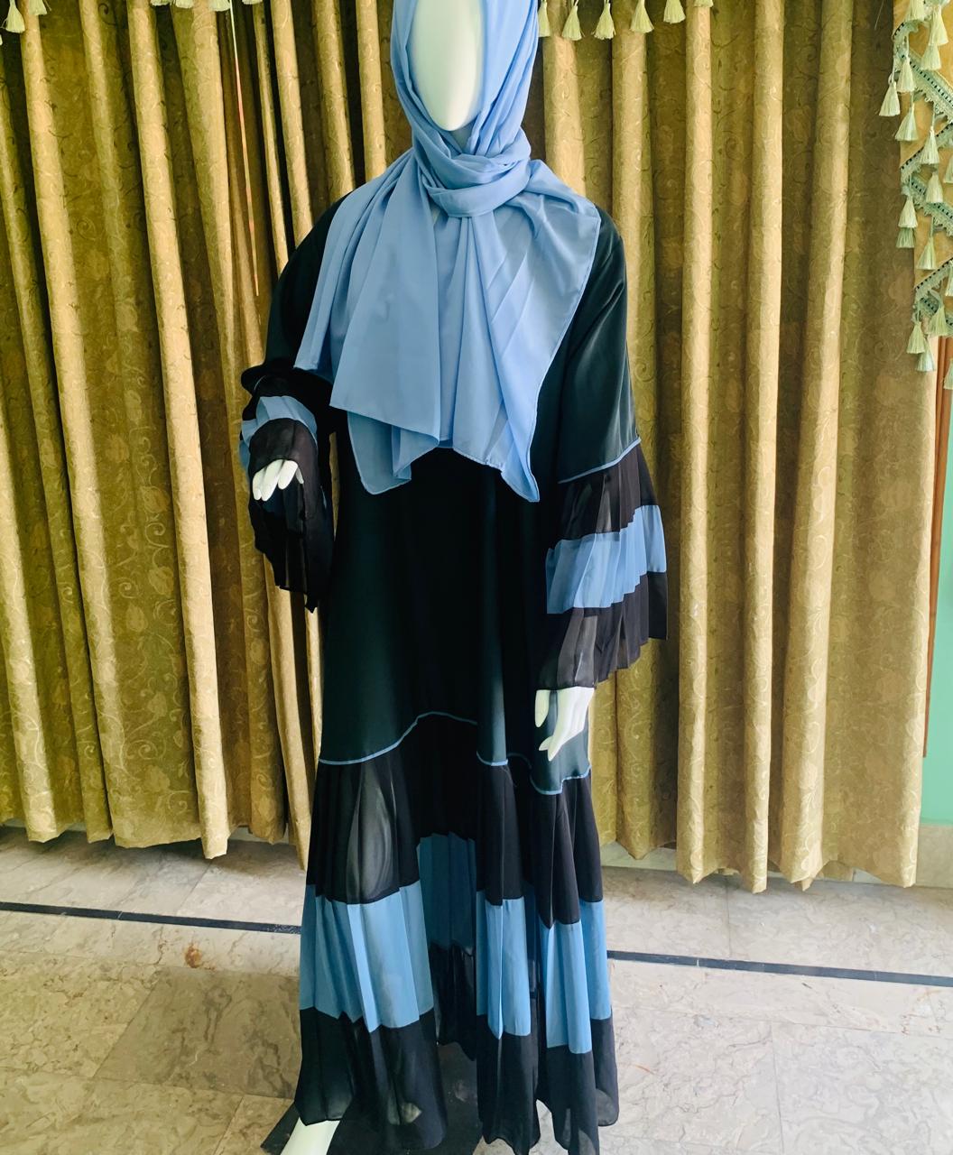 Black Nida base for smooth fall and comfort Abaya_Contrasting blue flair detailing on sleeves & border_Abayas for girls women